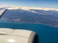 View from plane on the coast and mountains Royalty Free Stock Photo