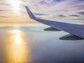 View from the plane window on the island in the Atlantic Ocean at dawn Royalty Free Stock Photo