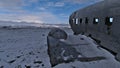 Plane wreckage of a DC-3 military airplane on Solheimasandur beach on the south coast in winter with sparse, snow-covered lands