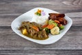 plate of Jamaican coconut goat curry