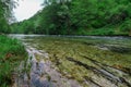 View of Pliva river surrounded by green vegetation. Sipovo, Bosnia and Herzegovina. Royalty Free Stock Photo