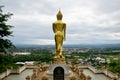 View point and buddha walking statue image at Wat Phra That Khao Noi in Nan, Thailand