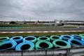 View from the pole position in a racetrack. Wheel close up