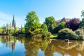 View of the pond and St. Lamberti Church of Oldenburg, Germany Royalty Free Stock Photo