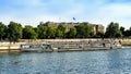 View on Pont de la Concorde and long cruise ship on Seine river in Paris in France