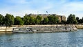 View on Pont de la Concorde and long cruise ship on Seine river in Paris in France