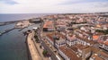 A view on Ponta Delgada marina, Sao Miguel, Azores, Portugal. Moored yachts and boats along the port piers on a Royalty Free Stock Photo