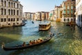 View from Ponte di Rialto to Venice, Grand canal, gondolas and big pleasure boat Royalty Free Stock Photo