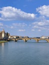 View from the Ponte Vecchio over the Arno river, in the Florence, Italy. Royalty Free Stock Photo