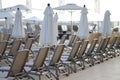 View pool bed, beach chair with umbrellas chaise lounges near the pool Royalty Free Stock Photo