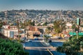 View of poor area of Tijuana Mexico with buildings on hill.