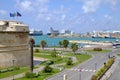 View on the port of Civitavecchia and a tower of the Fort Michelangelo in Civitavecchia, Italy.