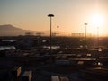 View of the port with containers awaiting shipment at sunset