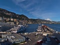View of the port of Monaco in the afternoon sun at the French Riviera with moored luxury superyachts Quantum Blue and IJE.