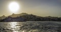 View of the port of Naxos and the hill of the historical center, the mountain system can be glimpsed at dawn,Naxos,Cyclades,Greece Royalty Free Stock Photo