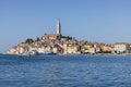 view from port Rovinj over Adriatic Sea to the peninsula with Old Town and tower of Saint Euphemia Church, Rovinj, Croatia Royalty Free Stock Photo