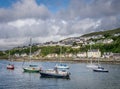 A view of a port with various ships and boats in Mallaig