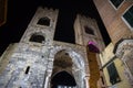 View of Porta Soprana or Saint Andrew`s Gate by night in Genoa, Italy