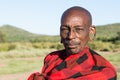 Portrait of a Maasai warrior with stretched ear lobe, Masai Mara, Kenya