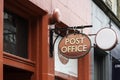 View of a post office sign in a street in Edinburgh downtown