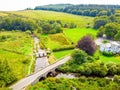 A view of Postbridge Clapper Bridge in Dartmoor National Park is a vast moorland in the county of Devon, in southwest England Royalty Free Stock Photo
