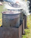 view with pots, cooking festive soup, picnic in nature, historical dishes Royalty Free Stock Photo