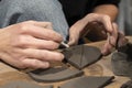 view of potter woman hands at work in workshop Royalty Free Stock Photo