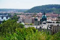 View of Prague and amazing buildings with red roofs.