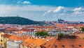 View of Prague Castle over red roof from Vysehrad area at sunset lights, Prague, Czech Republic. Scenic view of Prague city, Royalty Free Stock Photo