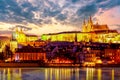 View of Prague Castle and Vltava river in Prague, Czech Republic during sunset time. World famous landmark in Europe Royalty Free Stock Photo