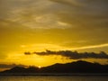 View of Praslin island from La Digue island beach at sunset. Seychelles Royalty Free Stock Photo