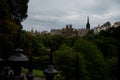View from Princes street to old town and castle in Edinburgh city, view on houses, hills and trees in old part of the city, Royalty Free Stock Photo