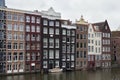 View from the Prins Hendrikkade street in Amsterdam to the old historical dutch buildings.