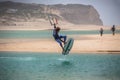 View of a professional sportsman practicing extreme sports Kiteboarding at the Obidos lagoon