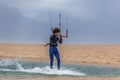 0View of a professional sportsman practicing extreme sports Kiteboarding at the Obidos lagoon