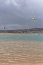 View of a professionals sports practicing extreme sports Kiteboarding at the Obidos lagoon