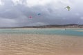 View of a professionals sports practicing extreme sports Kiteboarding at the Obidos lagoon