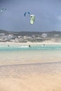 View of a professionals sports practicing extreme sports Kite-boarding at the Obidos lagoon, Foz do Arelho, Portugal Royalty Free Stock Photo