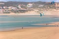 View of a professionals sports practicing extreme sports Kiteboarding at the Obidos lagoon
