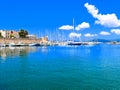 View of the promenade and the harbor from the sea. Alghero, Sardinia. Italy.
