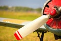 View on propeller on old russian airplane on green grass Royalty Free Stock Photo