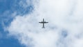 View of propeller plane flying with blue sky and clouds. Airplane fly Royalty Free Stock Photo