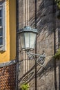 View of a public classic street lamp on exterior wall house