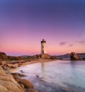 view of the Punta Palau Lighthouse on the Emerald Coast of Sardinia at sunrise