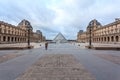 View Pyramid at courtyard of Paris Louvre Museum. Louvre Museum is one of the largest and most visited museums worldwide