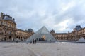 View Pyramid at courtyard of Paris Louvre Museum. Louvre Museum is one of the largest and most visited museums worldwide