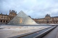 View Pyramid at courtyard of Paris Louvre Museum. Louvre Museum is one of the largest and most visited museums worldwide