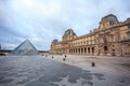 View Pyramid at courtyard of Paris Louvre Museum. Louvre Museum is one of the largest and most visited museums worldwide