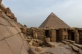 View on the Pyramid of Khafre with the Funerary Temple of the Pyramid of Menkaure in the foreground Royalty Free Stock Photo