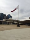 The Qatari flag flying outside the National Museum of Qatar Desert Rose